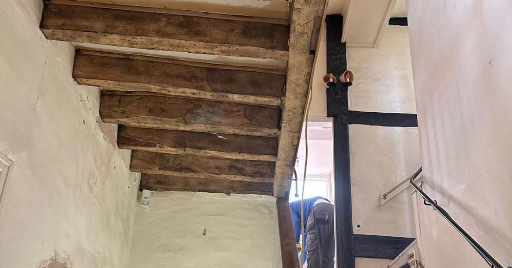 Oak beam cleaning at manor house near Chinnor, Oxfordshire